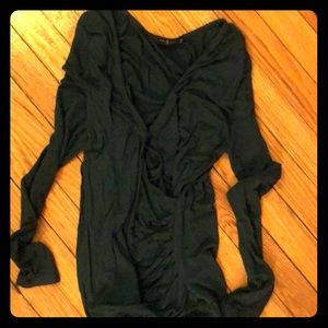 Dark green wrap blouse.